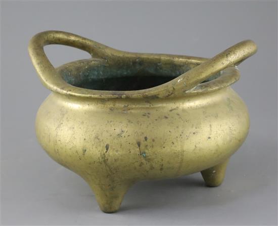 A large Chinese bronze tripod censer, Ding, Xuande four character seal mark, probably 18th / 19th century, W.25.5cm Diam. of rim 21.4cm